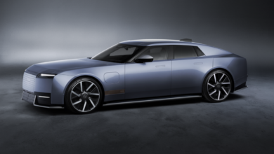 New Jaguar Type 01 electric luxury grand tourer featuring futuristic styling, a long hood and a sleek four-door silhouette.